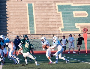 LYNDON FRANKLIN gets the ball from JACOB SIEGFRIED in a game against Patrick Henry on Friday, Aug. 28, 2015. Photo Courtesy of TRyan Photography (Tammy Ryan)