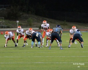 Phillip Naseh preparing to get the snap against Otay Ranch on Aug. 28, 2015. Photo Courtesy of Don DeMars Photography (Don DeMars)