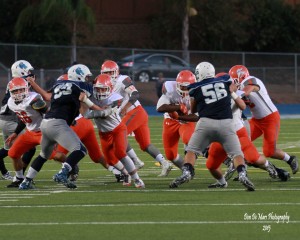 Jerome Johnson hits the hole against Granite Hills on Friday, Sept. 4, 2015.